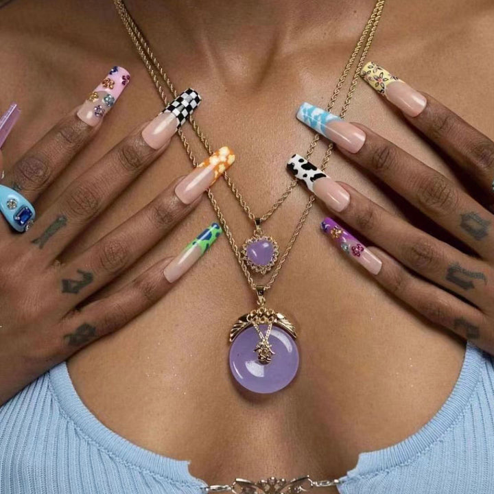 Nail art set with creative designs and shimmering accents Bowlift