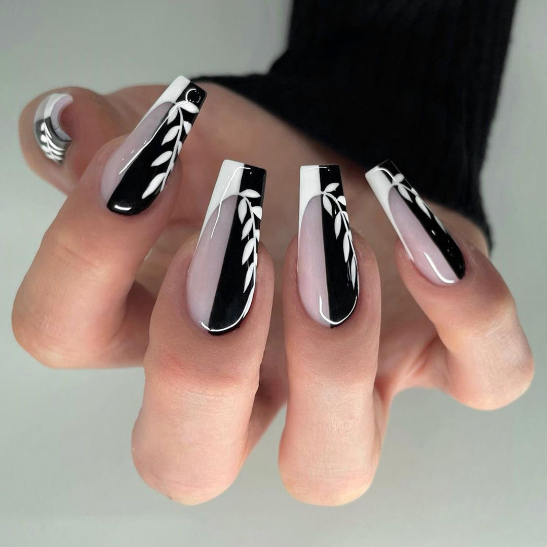 Artful nail extensions in elegant black and white design Bowlift
