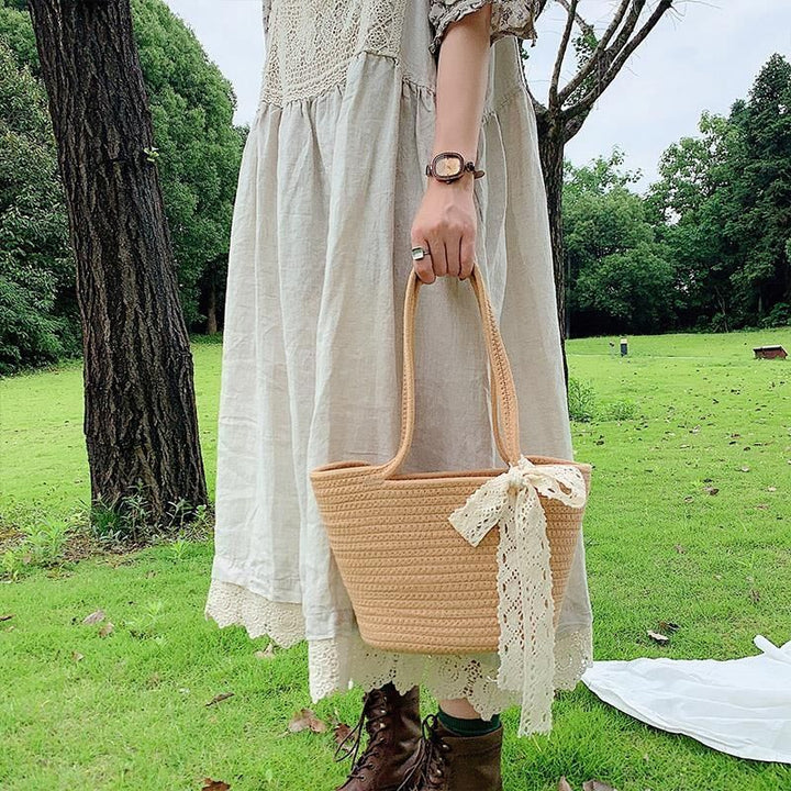 Handcrafted straw bag with lace accent Bowlift