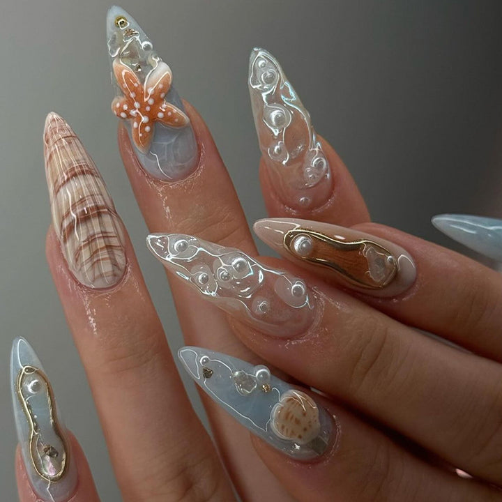 Artistic Press-On Nail Set with Shell and Floral Accents Bowlift