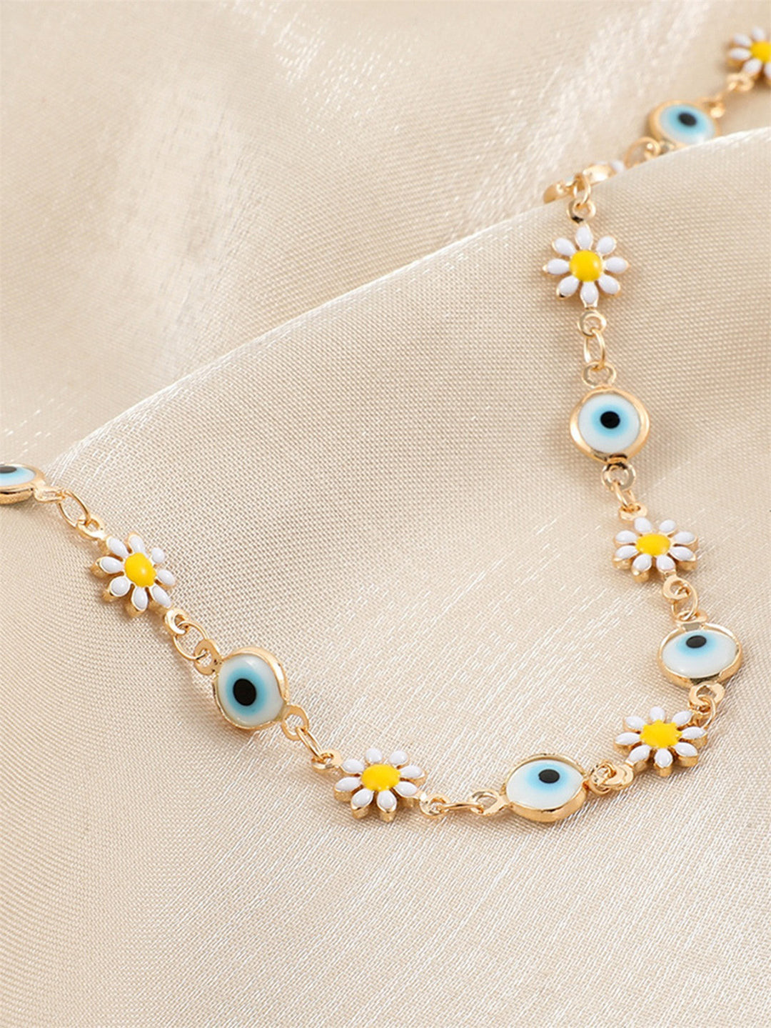 Flower and Eye Charm Bracelet Bowlift