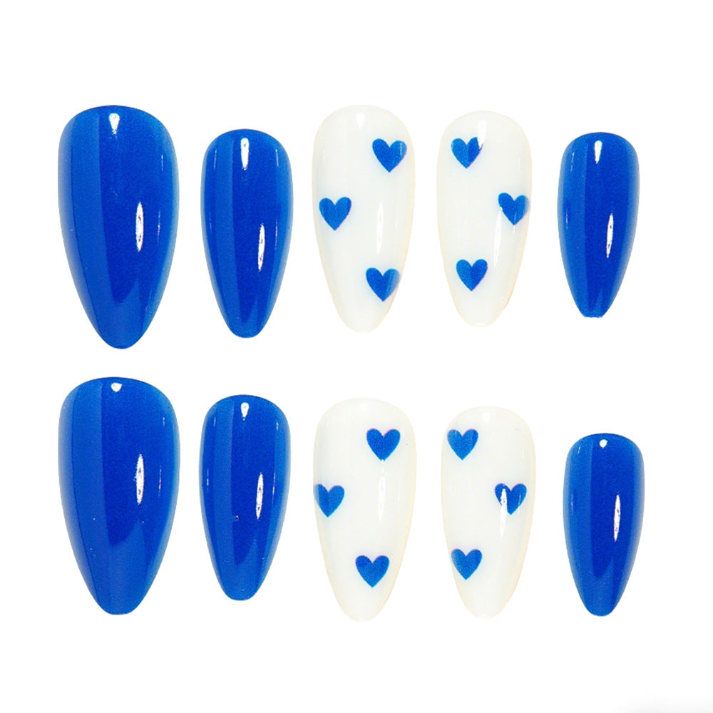 Stylish Long Stiletto Nail Art Tips with Heart Accents Bowlift
