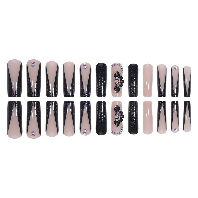 Glamorous Long Stiletto Press-On Nails with Glitter and Floral Accents Bowlift