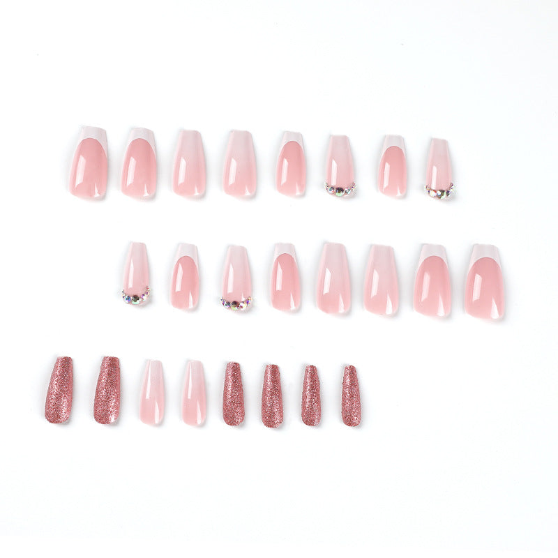 Glamorous artificial nails with rhinestone accents Bowlift