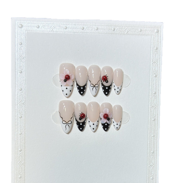 Artistic Stiletto Press-On Nail Set with Floral and Insect Designs Bowlift