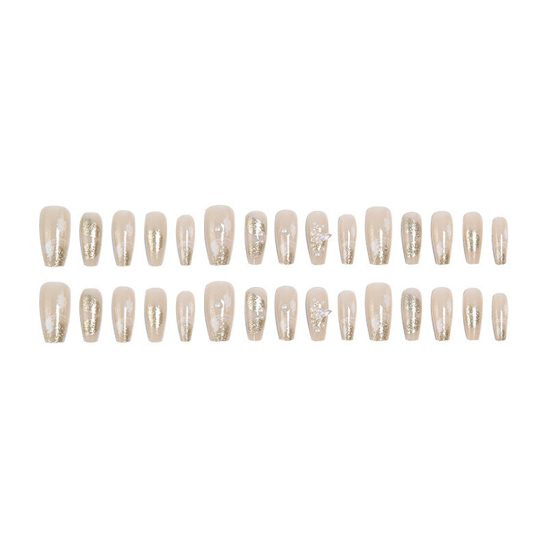 Glamorous artificial nails with heart-shaped accents Bowlift