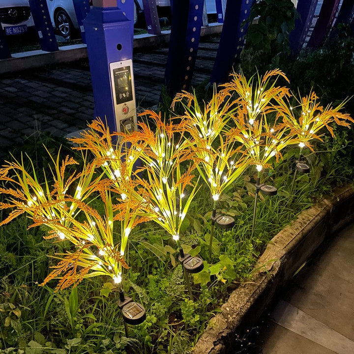 Solar Ornamental Grass Stake Lights With Warm White LED Accents Bowlift