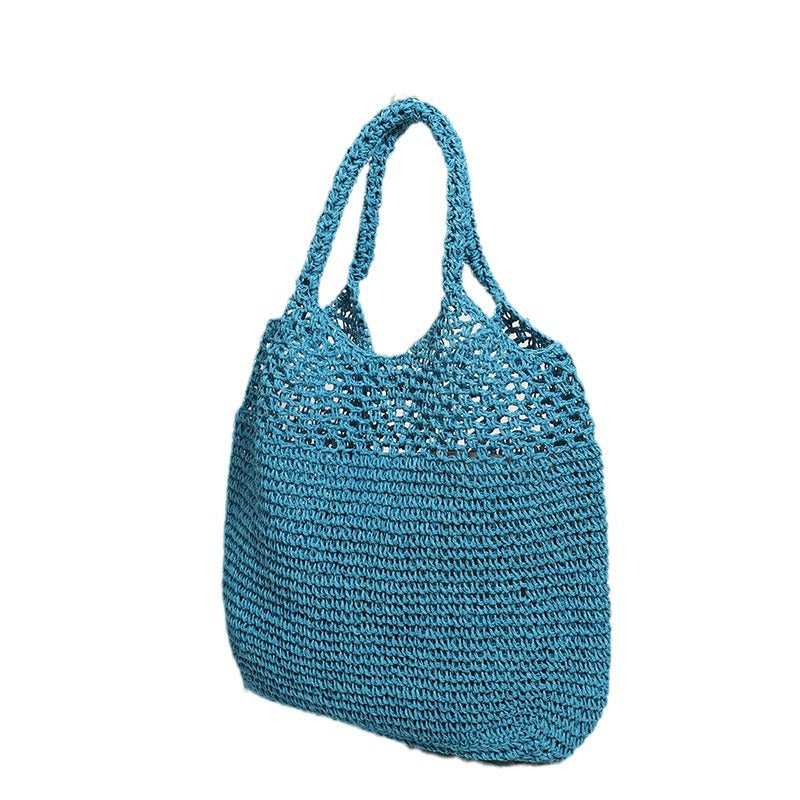 Handcrafted straw bag with wide carrying handle Bowlift