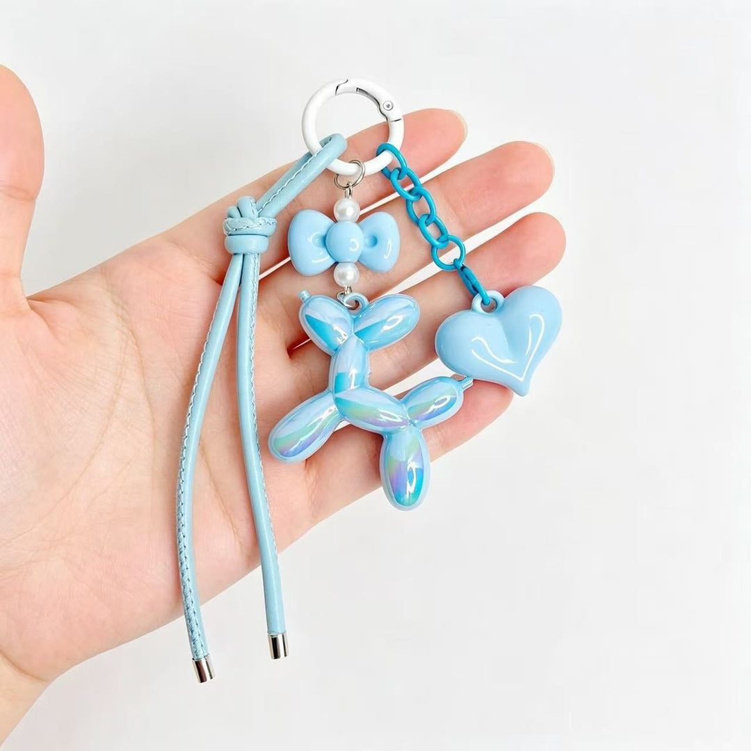 Playful keychain with heart and balloon dog Bowlift