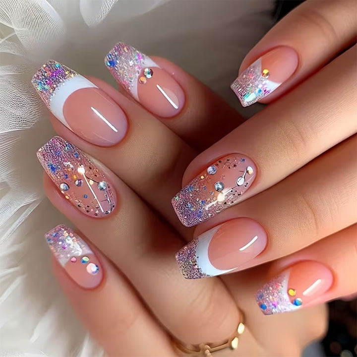 Glamorous artificial nails with glitter and rhinestone embellishments Bowlift