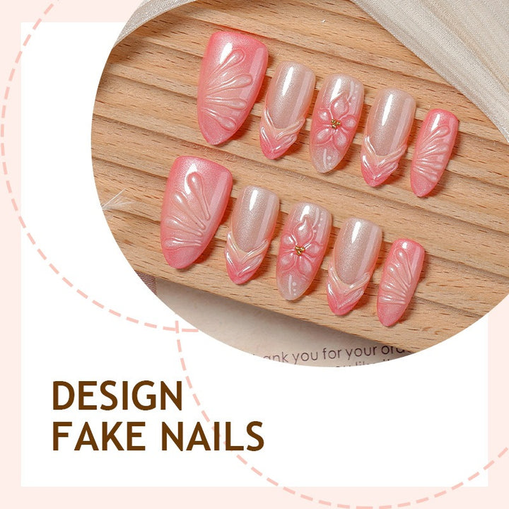 Artificial nail set with filigree flowers and glitter accents Bowlift