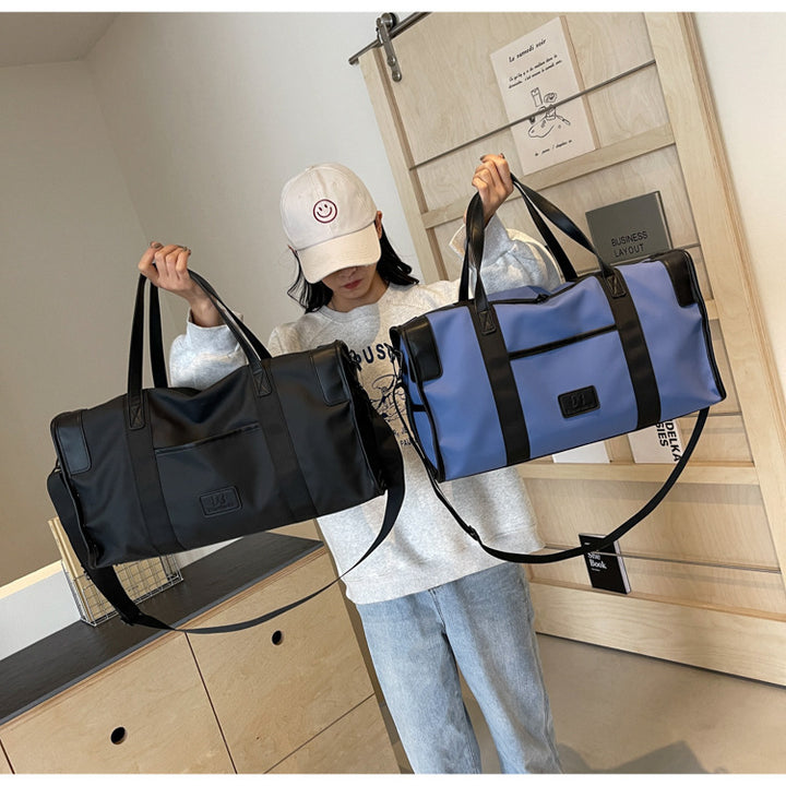 Practical sports and travel bag with durable carrying handles Bowlift
