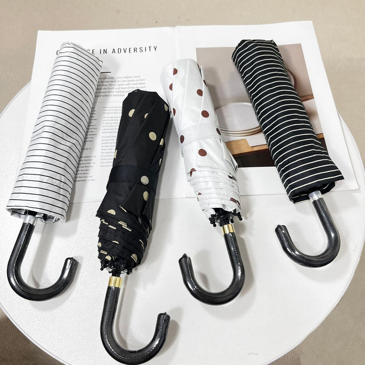 Women Folding Umbrella Bowlift