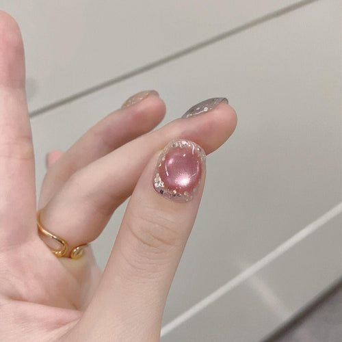 Artificial acrylic nails with shimmering effects and elegant glitter accents Bowlift