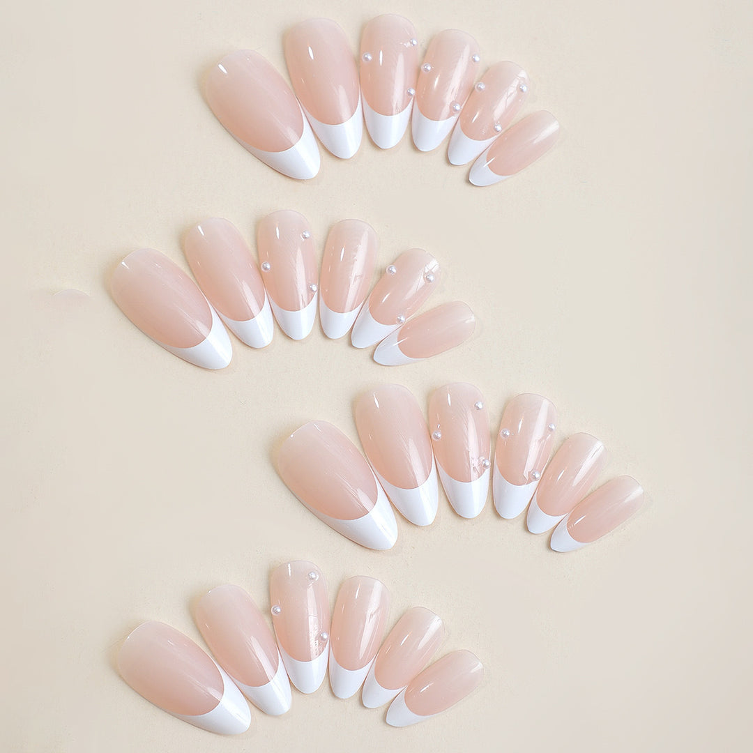 Artificial nail set with elegant tips and pearl decorations Bowlift