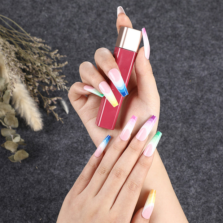 Artificial nails in luxurious ombre design with rhinestone accents Bowlift