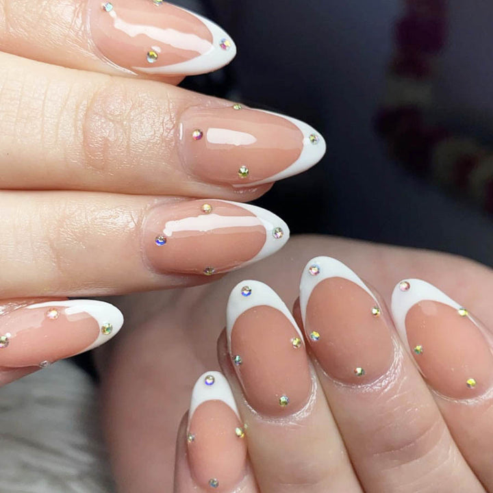 Nail kit with elegant French tips and sparkling accents Bowlift