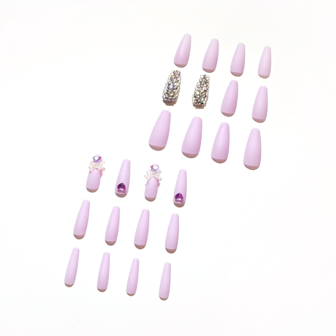 Artistic Stiletto Nails with Glitter and Flower Decorations Bowlift