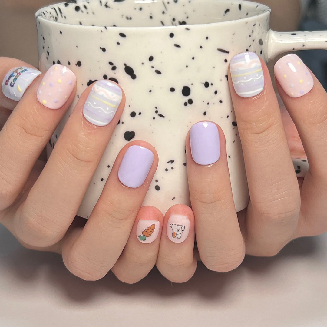 Artful nail art with cute animal motifs and pastel-colored design Bowlift
