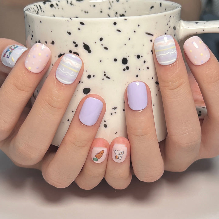 Artful nail art with cute animal motifs and pastel-colored design Bowlift