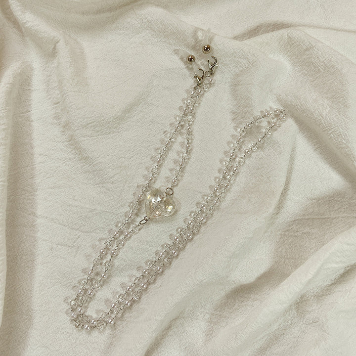 Elegant jewelry necklace with heart-shaped pendants Bowlift