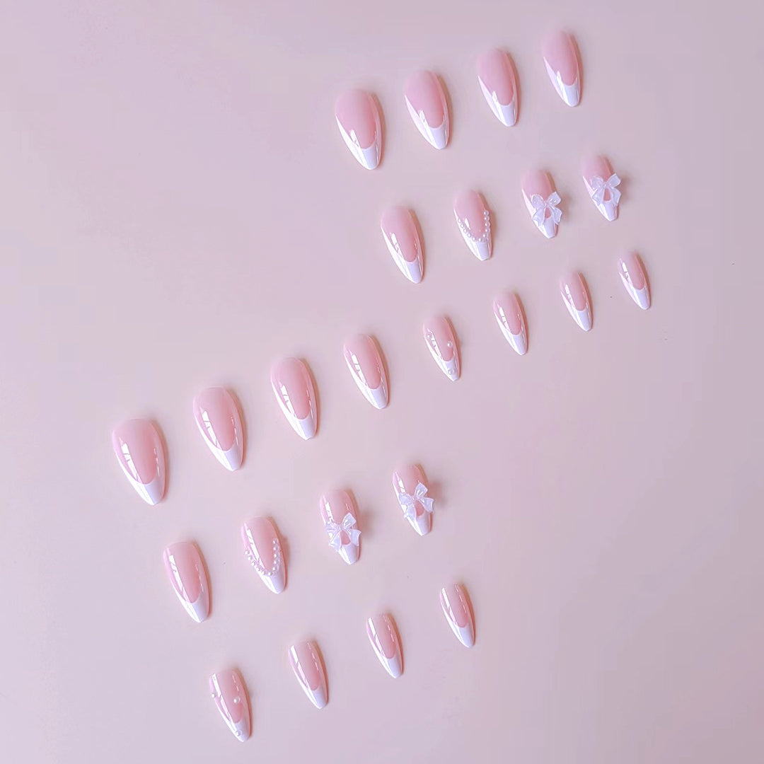 Nail art set with elegant tips and floral accents Bowlift