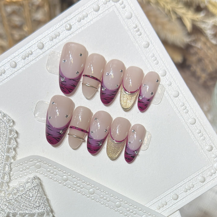 Artistic Stiletto Press-On Nail Set with Rhinestone Accents Bowlift