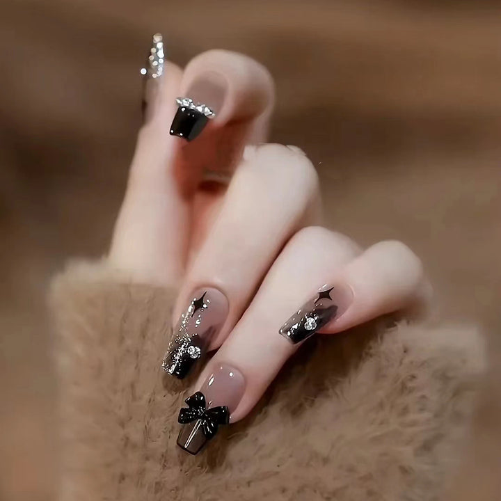 Artificial artificial nails with heart design and glitter details Bowlift