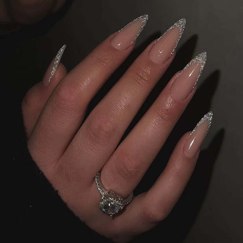 Glamorous stiletto artificial nails with glitter tips Bowlift