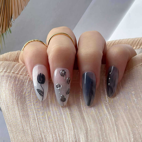 Artistic Stiletto Press-On Nail Design with Contemporary Accents Bowlift