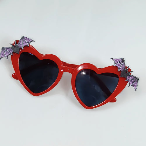 Heart-Shaped Sunglasses with Bat Accents Bowlift