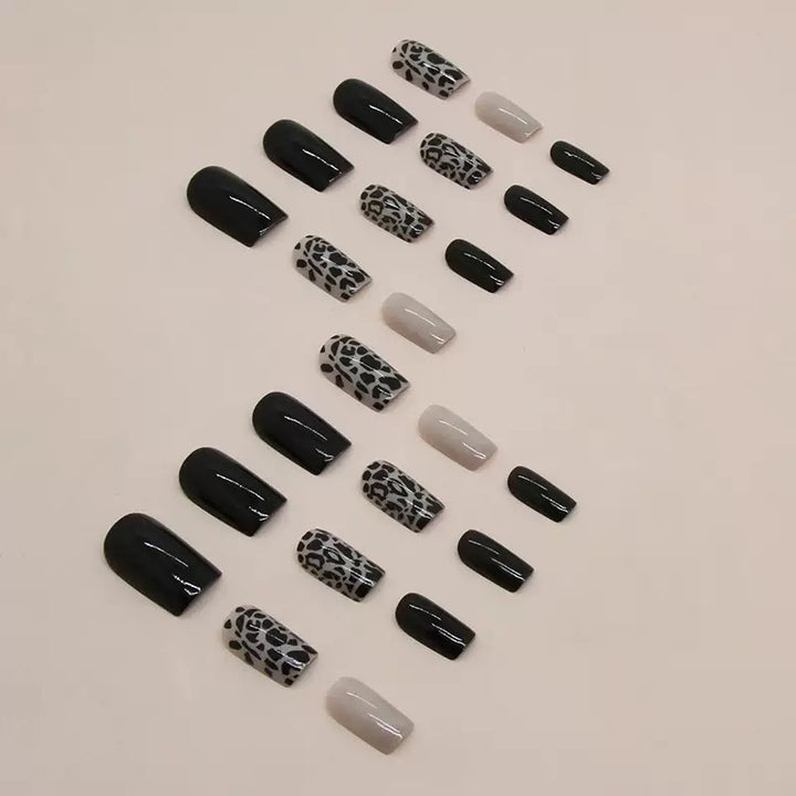 Acrylic nail set with stylish leopard pattern and elegant accents Bowlift