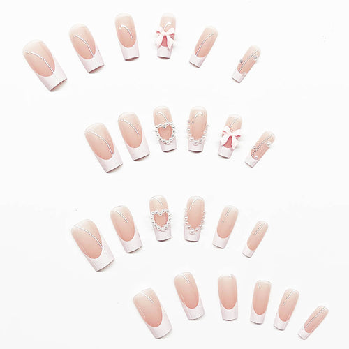 Artificial nail set with elegant 3D flowers and pearl embellishments Bowlift