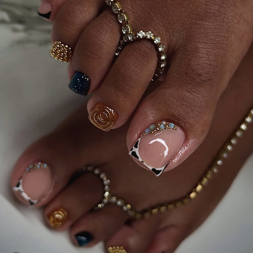Artful toenail design with floral and sparkling accents Bowlift