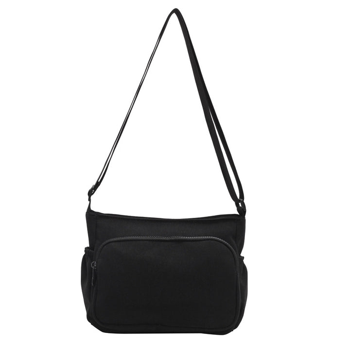 Practical shoulder bag with versatile storage compartments Bowlift