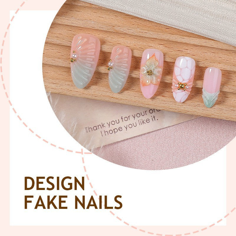 Artificial nail set with glamorous flower and glitter details Bowlift