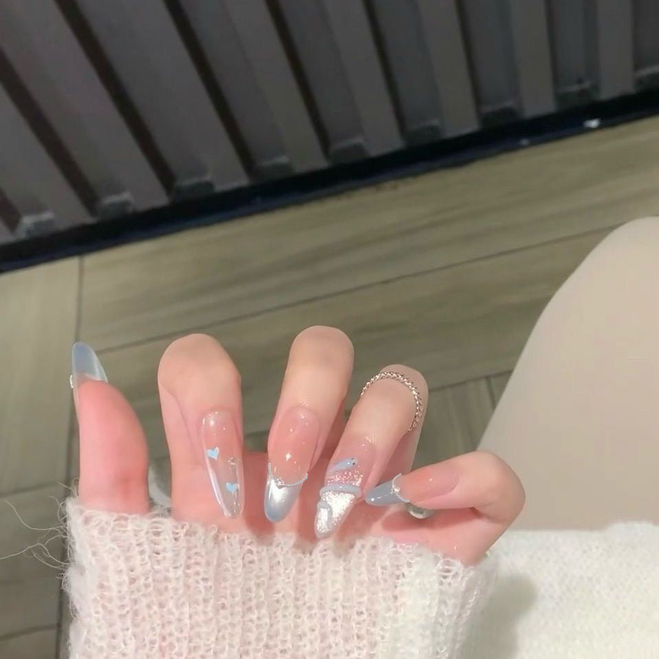 Artistic Nail Design with Decorative Elements Bowlift