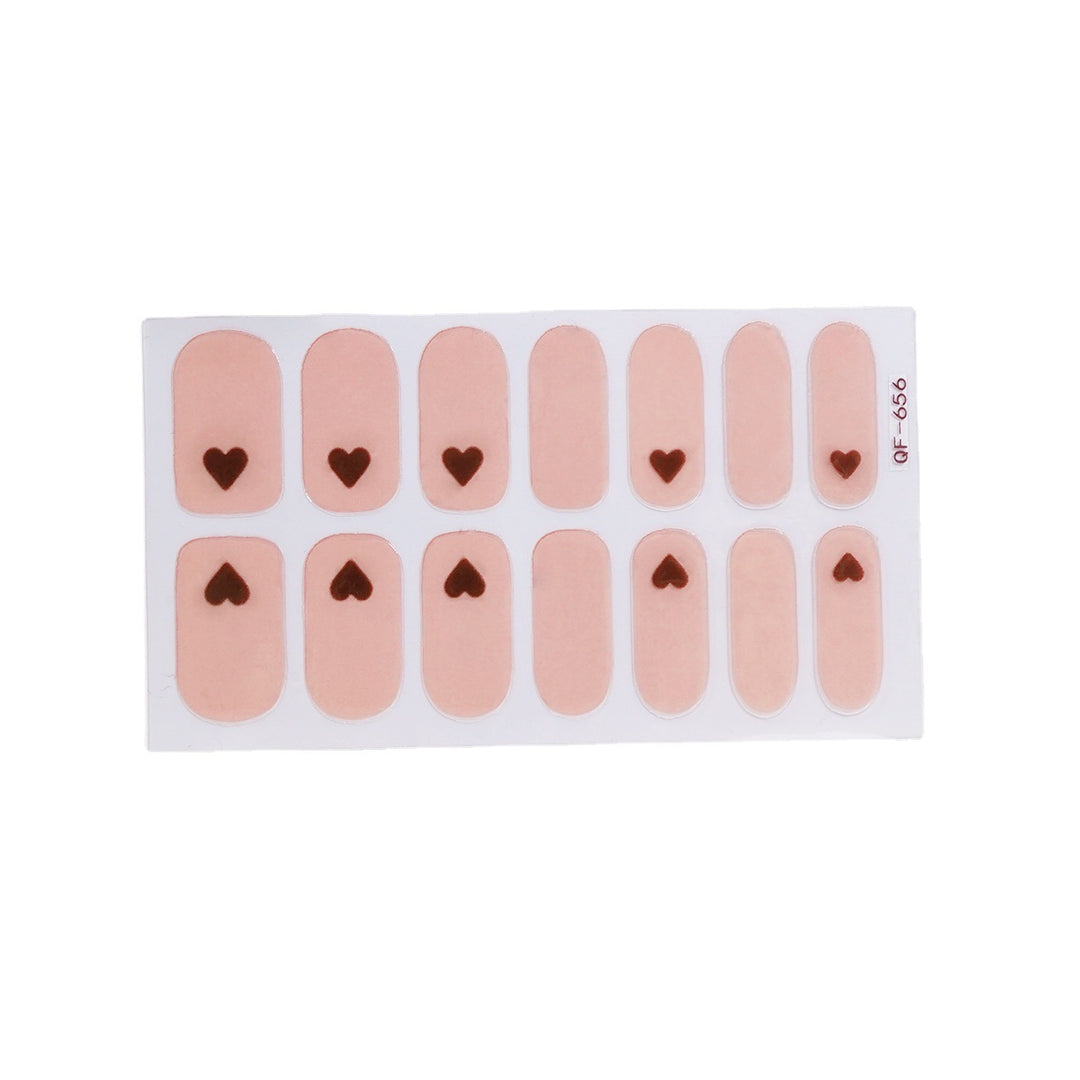 Artificial nail art with heart-shaped designs and soft color gradients Bowlift