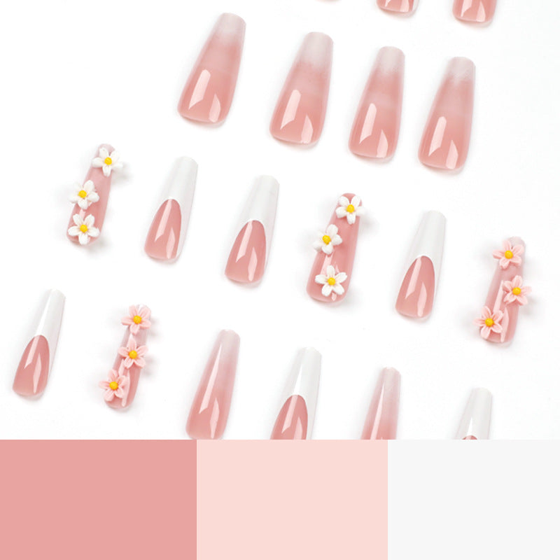 Artful nail extensions with elegant gradient and creative floral accents Bowlift