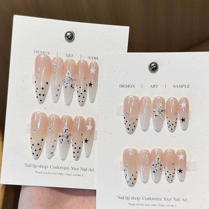 Acrylic Nails Set with Creative Designs and Shimmering Accents Bowlift