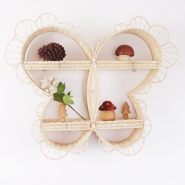 Playful wall shelf in butterfly design Bowlift