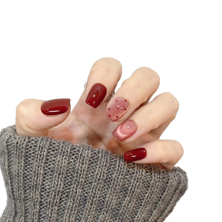 Artificial nail tips with creative dots and high gloss finish Bowlift