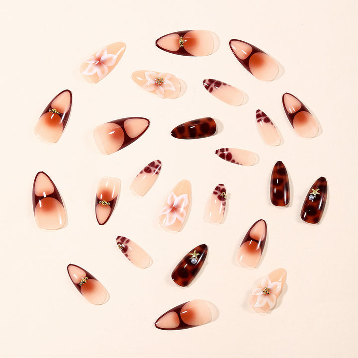 Stiletto Nail Art Extensions with Floral and Star Accents Bowlift