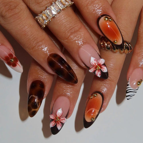 Artificial nail set with floral and creative decorations Bowlift