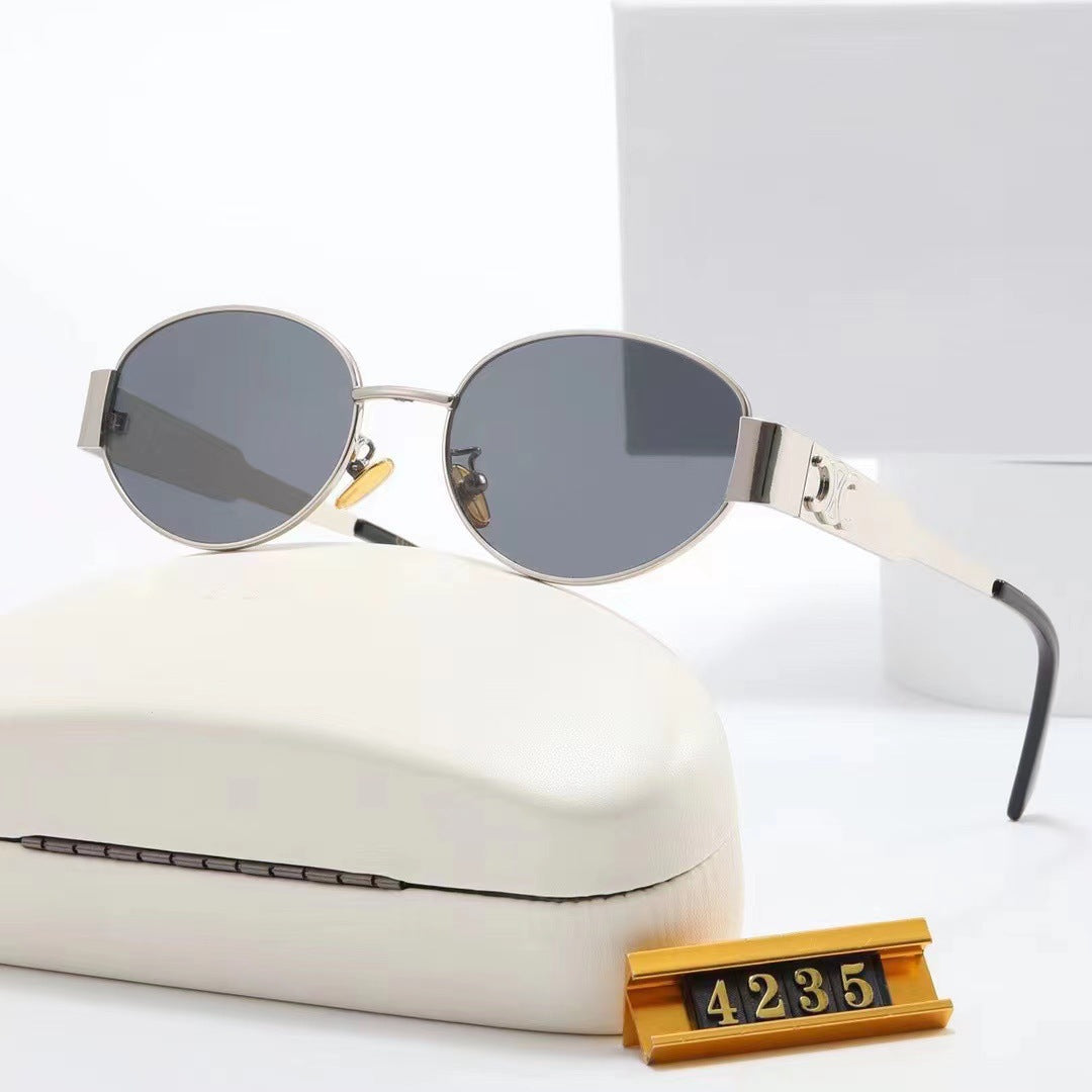 Women elegant oval sunglasses with gold-colored frame Bowlift