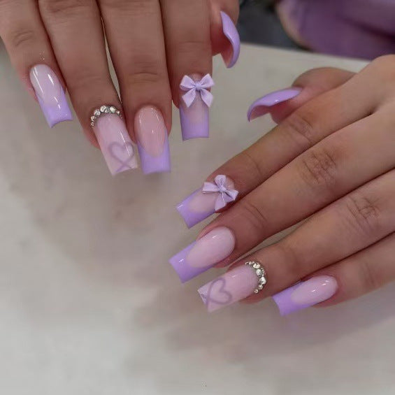 Artificial nail set with elegant 3D bows and glitter details Bowlift