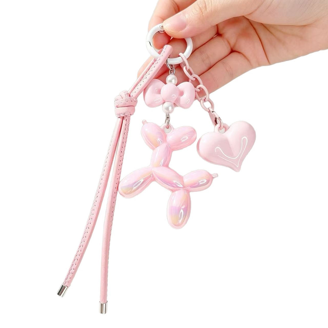 Playful keychain with heart and balloon dog Bowlift