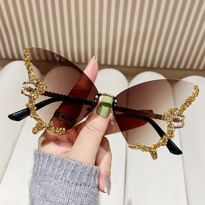 Women's extravagant sunglasses with sparkling butterfly design Bowlift