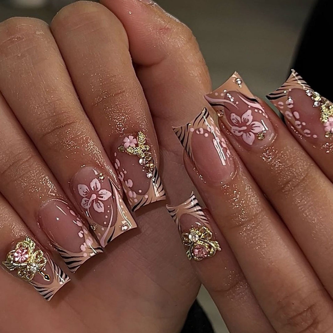 Artistic Press-On Nails with Floral and Gemstone Accents Bowlift