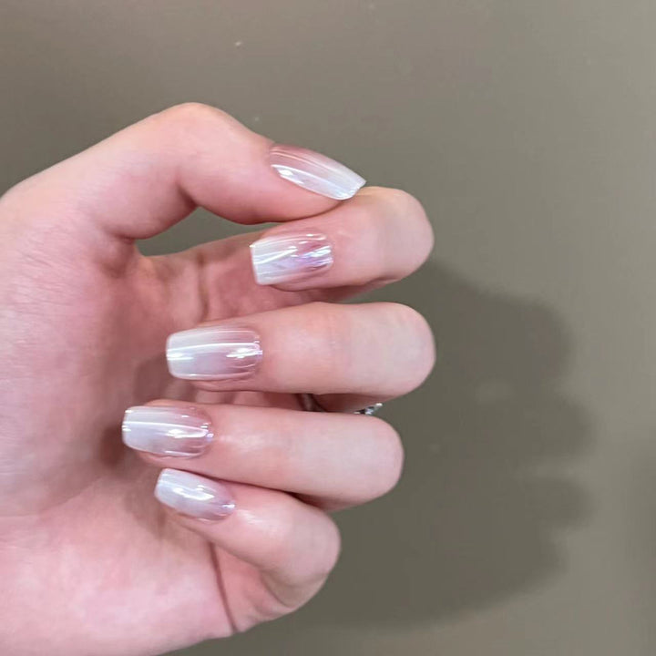 Artificial nail extensions in elegant ombre design Bowlift
